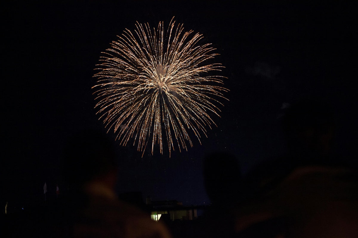 what side do roman candles come out of